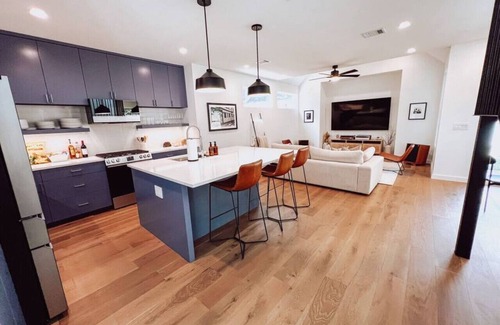 Holly House | Stylish Downtown Home with Hot Tub and Lake Views