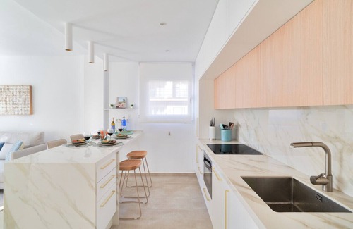 Marbella City Centre Apartment | Prime Downtown Marbella: Steps to Beach with Pool Access