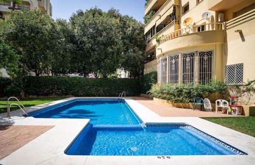 Marbella City Centre Apartment | Prime Downtown Marbella: Steps to Beach with Pool Access