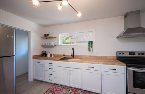Paso Robles Cottage | Experience the Downtown Neon Pink Chalet with Ocean Views