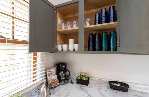 Michigan City Apartment | Pet-Friendly Downtown Retreat with Hot Tub & Firepit
