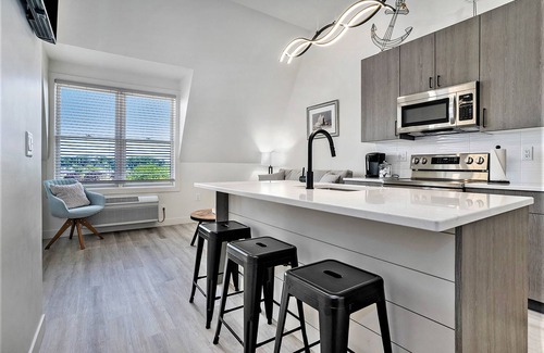 South Haven Condo | Exceptional Downtown Riverfront Condo Steps from Dining & Nightlife