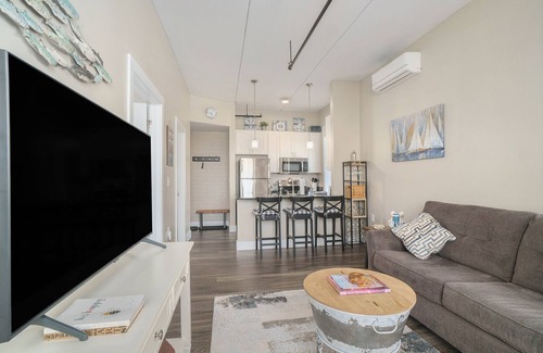 Manistee Condo | Stunning Downtown Waterview Condo with Spa & Family Amenities