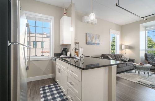 Manistee Condo | Stunning Downtown Waterview Condo with Spa & Family Amenities
