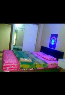 South Tangerang Apartment | Inviting Stays at DR.ROOM APARTEMEN with Pool & Family Fun