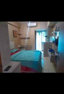 South Tangerang Apartment | Inviting Stays at DR.ROOM APARTEMEN with Pool & Family Fun