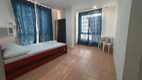 Romblon Island House | Budget-Friendly DRA Guesthouse with Family Amenities