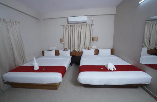 Nedumbassery Cabin | Budget-Friendly Dreams Airport Residency with Breakfast Included