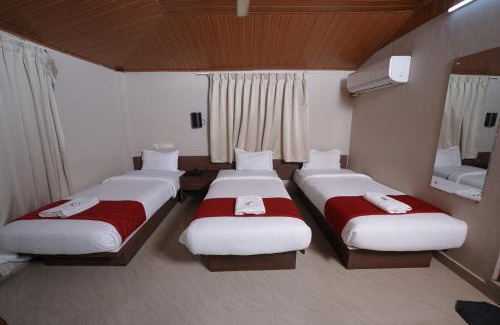 Nedumbassery Cabin | Budget-Friendly Dreams Airport Residency with Breakfast Included