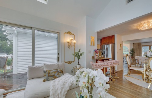 Lake Grove Cottage | Paradise Dreams: Luxury Home with Pool for Families