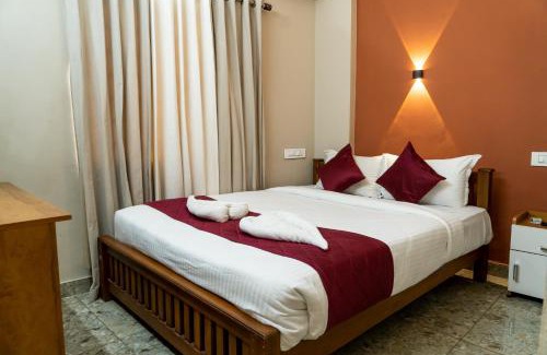 Alwaye Hotel | Guest Favorite: Dreams Paradise Airport Residency Awaits