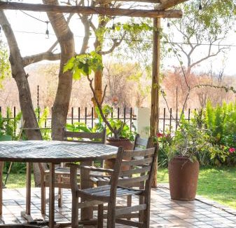 Victoria Falls Cabin | Discover Drift Inn: Family-Friendly Stay with Pool & Spa