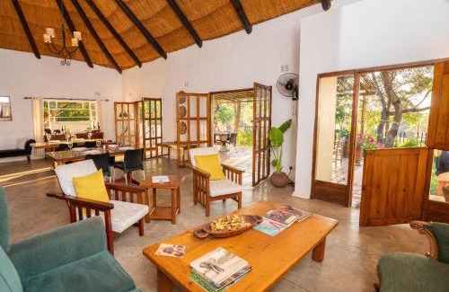 Victoria Falls Cabin | Discover Drift Inn: Family-Friendly Stay with Pool & Spa