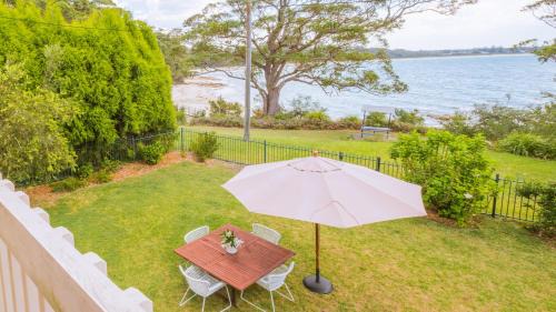 Vincentia House | Beachfront Bliss at Driftwood: Pet Friendly & Ocean Views