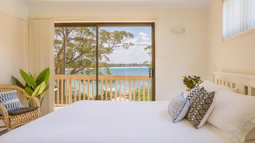 Vincentia House | Beachfront Bliss at Driftwood: Pet Friendly & Ocean Views