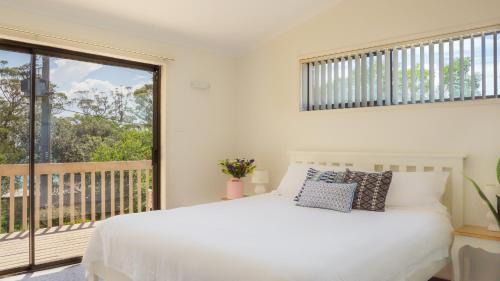 Vincentia House | Beachfront Bliss at Driftwood: Pet Friendly & Ocean Views