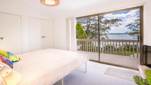 Vincentia House | Beachfront Bliss at Driftwood: Pet Friendly & Ocean Views