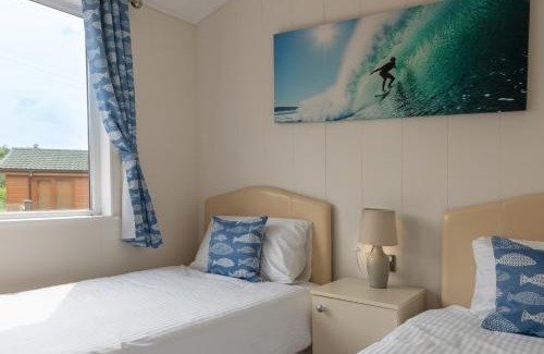 Mullacott House | Idyllic Driftwood Lodge: Pet & Child-Friendly Retreat