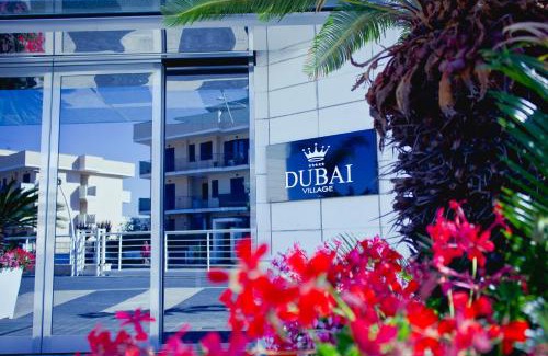 Camposano Resort | Discover DubaiVillage: Oceanfront Retreat with Pool & Spa