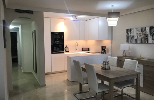 Castillo de Sabinillas Apartment | Family-Friendly Duguesa Fairways: Pool & Ocean Views Await
