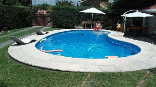 Villa Carlos Paz Apartment | Top-Rated Dulce Sueño: Family-Friendly with Pool & Pets