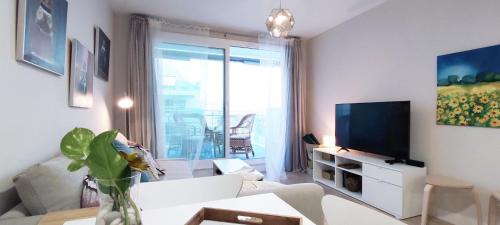 El Morche Apartment | Beachfront Dunas Apartment with Pool & Ocean Views