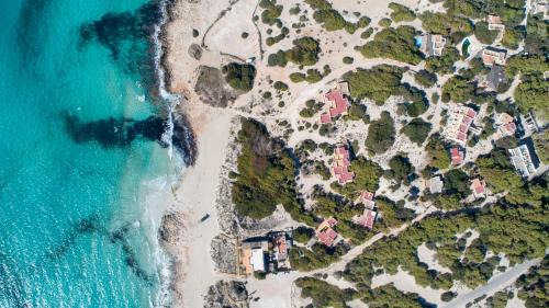 Calo de Sant Agusti Hotel | Elegant Dunas de Formentera: Oceanfront Pool & Dining