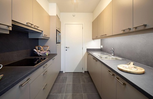 Bredene Apartment | Oceanfront Retreat: Dune and Sea with Amazing Amenities