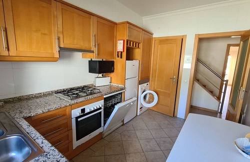 Vale de Carro Condo | Inviting Duplex with Pool View, BBQ & Steps to the Beach