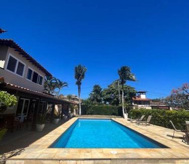 Manguinhos House | Elegant Duplex Geriba with Pool, Sauna & Expansive Yard