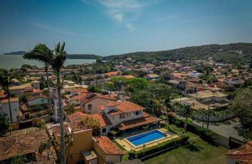 Manguinhos House | Elegant Duplex Geriba with Pool, Sauna & Expansive Yard