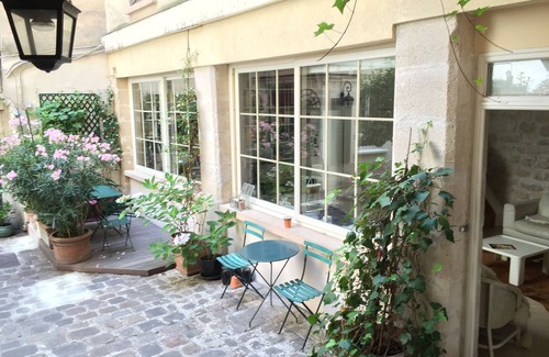 Arsenal Apartment | Elegant Duplex with 2 Bedrooms in Le Marais Center