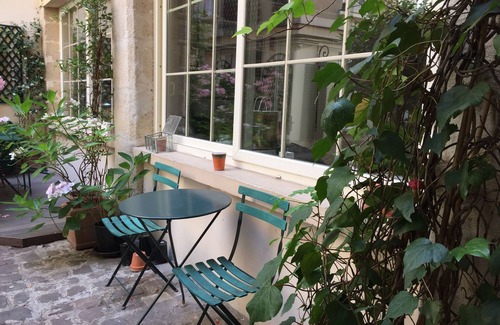 Arsenal Apartment | Elegant Duplex with 2 Bedrooms in Le Marais Center