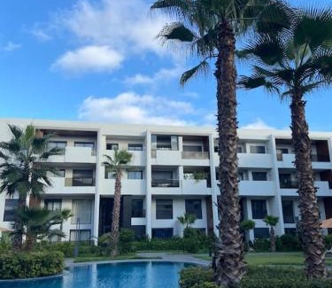 Bouskoura Apartment | Elegant Duplex Luxe with Pool & Ocean View in Casablanca