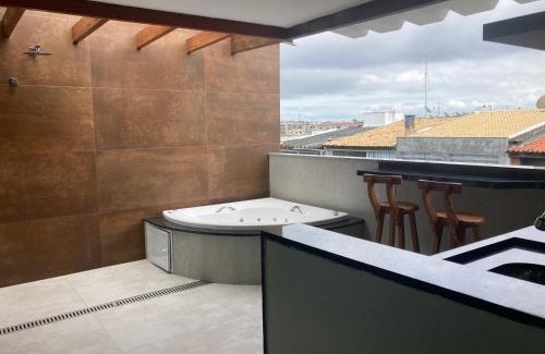 Centro Apartment | Elegant Duplex with Oceanfront Views and Hot Tub