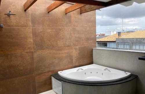 Centro Apartment | Elegant Duplex with Oceanfront Views and Hot Tub