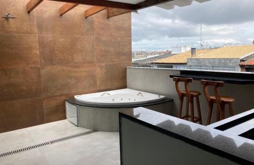 Centro Apartment | Elegant Duplex with Oceanfront Views and Hot Tub