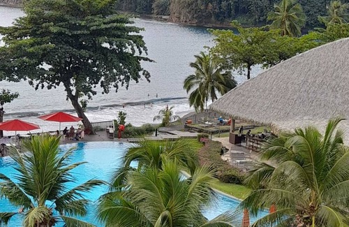 Arue Apartment | Beachfront Duplex with Pool, Sauna & Fitness Center