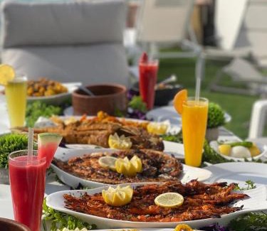 Durrat Al-Arous Ski Chalet | Relax at Rose Beach Villas with Oceanfront Pool Access