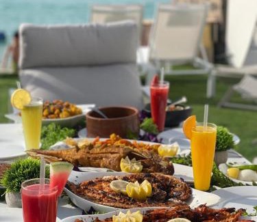 Durrat Al-Arous Ski Chalet | Relax at Rose Beach Villas with Oceanfront Pool Access