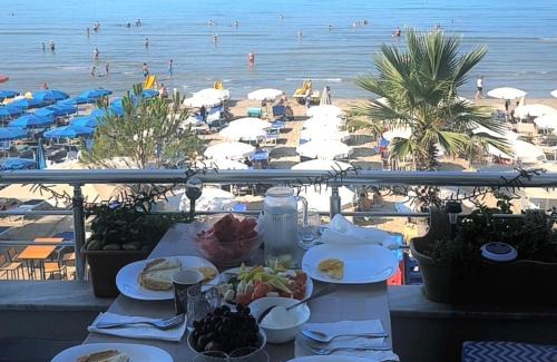 Rade Apartment | Oceanfront Escape at Durres Strand with Spa & Dining