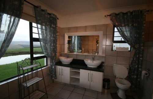 Piet Retief House | Discover Dusk to Dawn Guesthouse: 4-Star Family Retreat