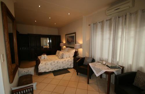 Piet Retief House | Discover Dusk to Dawn Guesthouse: 4-Star Family Retreat