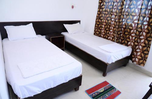 Bodh Gaya House | Welcoming Dwarka Home Stay: Pet & Child Friendly Retreat