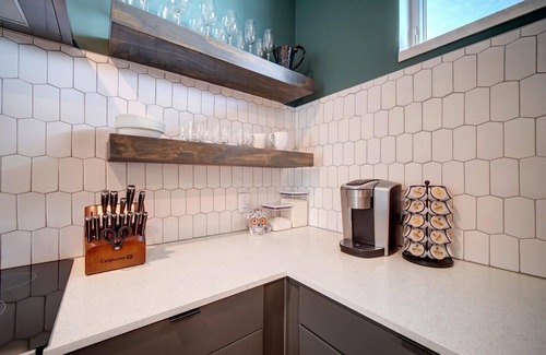 Holly Condo | Ideal E 5th St Escape: Pet-Friendly with Prime Location