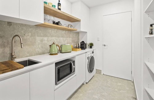 Marcoola House | Pet Friendly Beachfront Villa with Heated Pool & E-Bikes