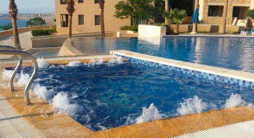 Sweimeh Apartment | Cozy Stay at E03 Samarah Resort Apartments with Ocean View