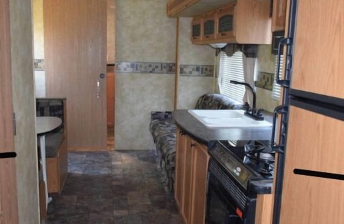Onanole House | Pet-Friendly Eagle Camper Experience at Sunset Bay