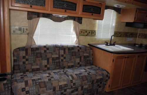Onanole House | Pet-Friendly Eagle Camper Experience at Sunset Bay