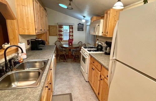 Gladwin Cabin | Eagle's Nest: Scenic Lakefront Retreat with Huge Deck